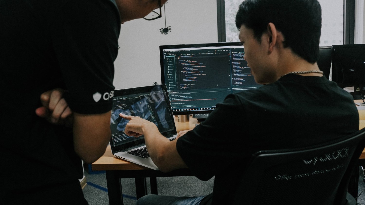 UpStream analysts reviewing an investigation at a workstation